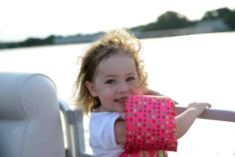 Gorgeous girl, loving the sunset boat ride.